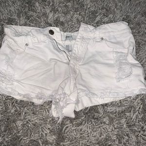 white denim shorts and light wash blue jean shorts